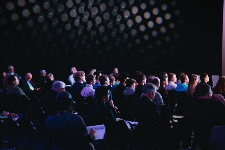 Crowd sitting at conference