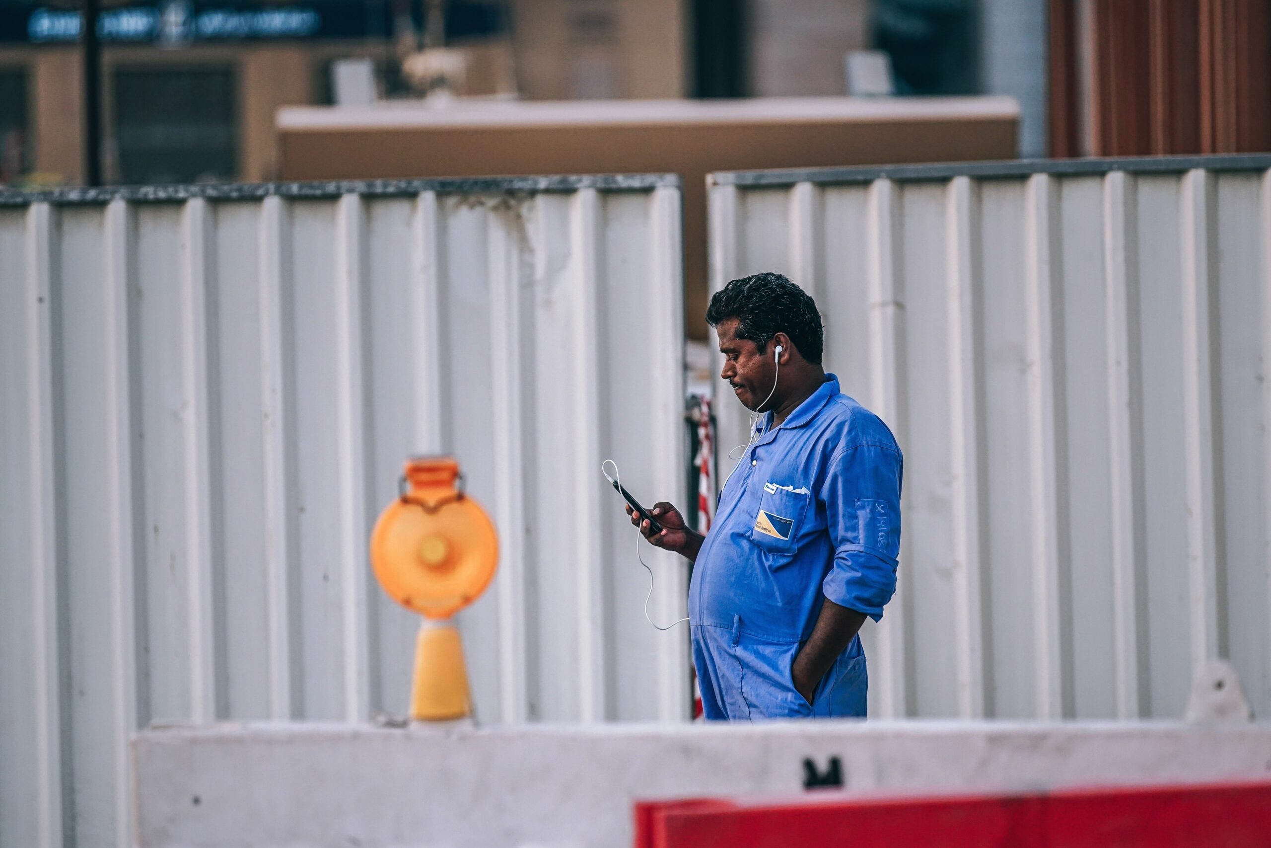 man listening audio mobile scaled