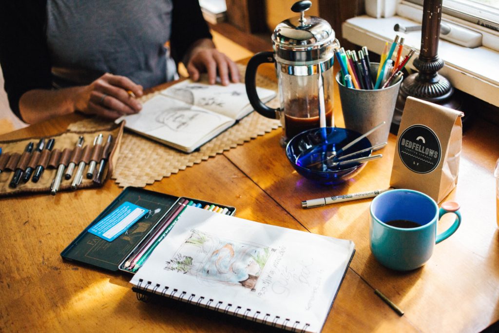 man and coffee on table