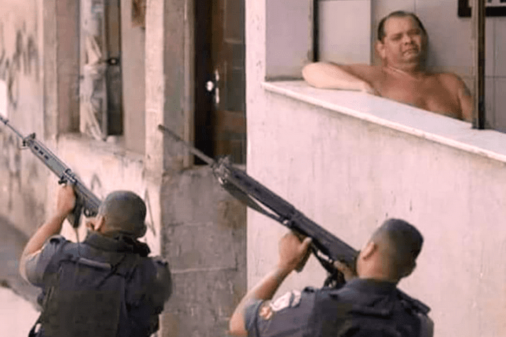 two soldiers shooting, man relaxing in a bath